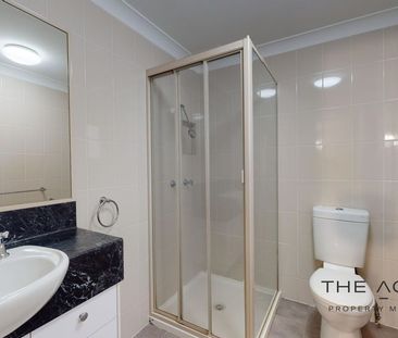 This well presented high set 2 bedroom residence offers low mainten... - Photo 4