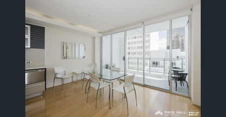 Fully furnished contemporary Living at Condor Towers - Photo 4