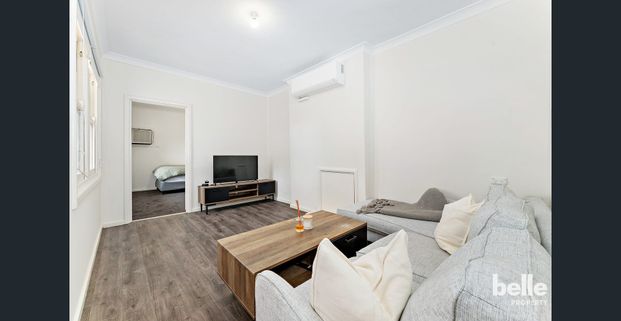 Modern & Charming 3-Bedroom - Photo 1