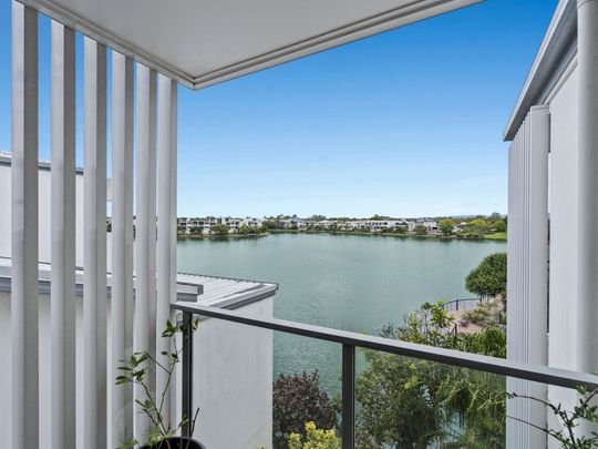 Elegant Waterfront Townhouse in the Heart of Emerald Lakes - Photo 1