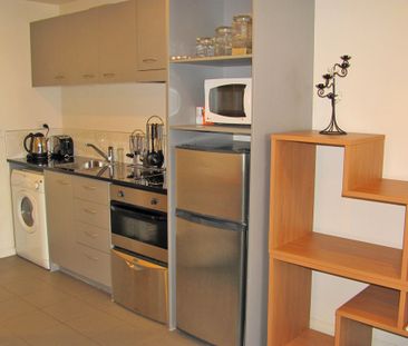 Tastefully Furnished with Balcony - Photo 4