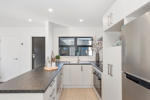 Located on Bruce Avenue, this modern two-bedroom unit offers comfortable, low-maintenance living in a fully secure setting with an automatic gate. - Photo 1