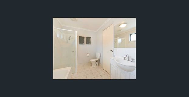 PRIME PARKDALE LOCATION - 3-BEDROOM SINGLE LEVEL TOWNHOUSE - Photo 1