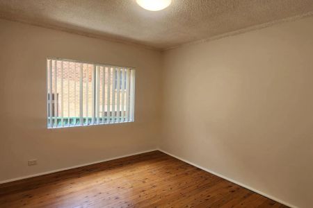 CONVENIENTLY LOCATED TWO BEDROOM UNIT - Photo 3