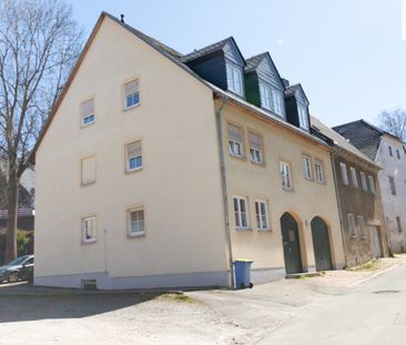 Moderne 1-Raum-Wohnung mit Einbauküche und PKW-Stellplatz im Zentru... - Foto 1