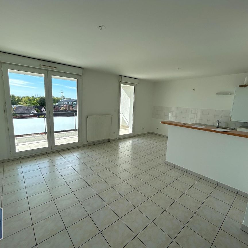 Location Appartement 3 pièces 66m² LINGOLSHEIM 67380 - Photo 1