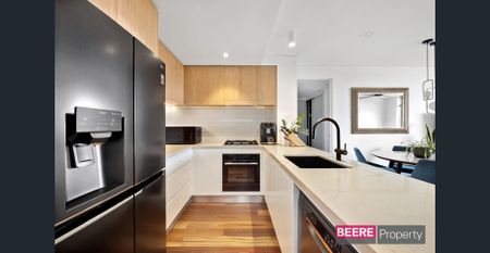 Elegant Unit with Floorboards & New Kitchen - Photo 3