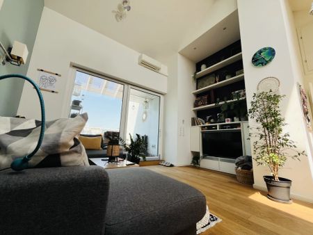 Exklusive Dachgeschosswohnung mit außergewöhnlichem Raumgefühl und hochwertiger Ausstattung - Photo 5