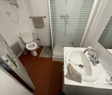 Location Appartement 2 pièces 31m² NIMES 30000 - Photo 4
