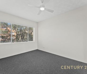 Spacious Two Bedroom Unit with Garage - Photo 1