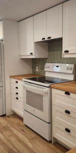 3 1/5 complètement rénové avec électroménagers à Chomedey - Photo 3