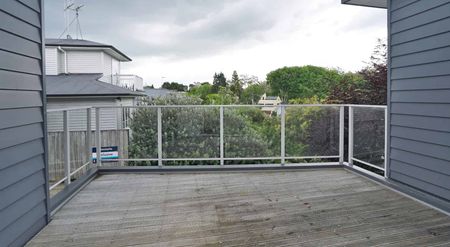 Located close to town and featuring modern finishes throughout! - Photo 2