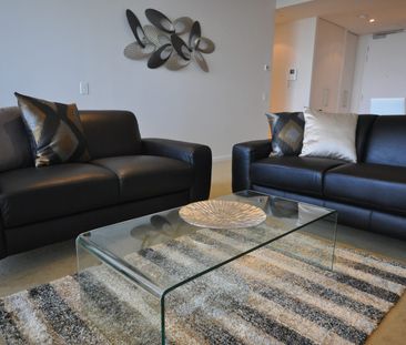 Available Now! Stylish and Modern Highrise Apartment - Photo 2