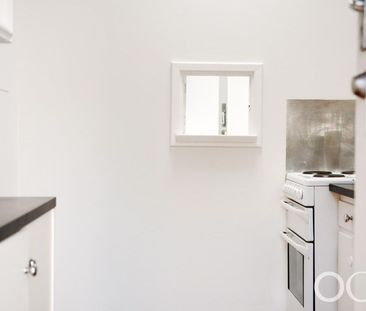 Open the Door to Peaceful Living in a Leafy Creekside Setting - Photo 2