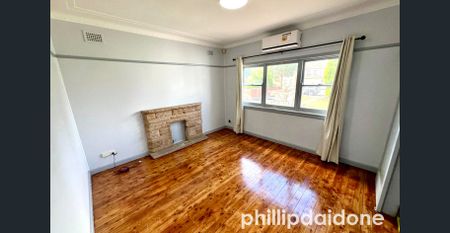 NEAT & WELL-PRESENTED 2 BEDROOM HOME IN PRIME LOCATION - Photo 2