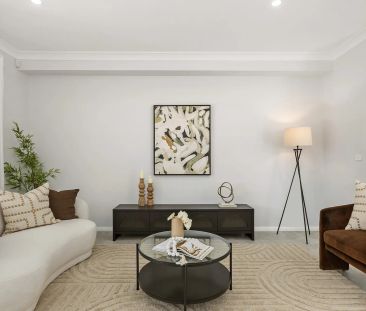Brand New Four Bedroom Duplex In a Prime Location - Photo 2