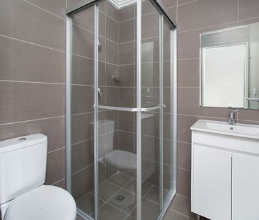 Spacious Two Bedroom Townhouse with Three Car Garage - Photo 4