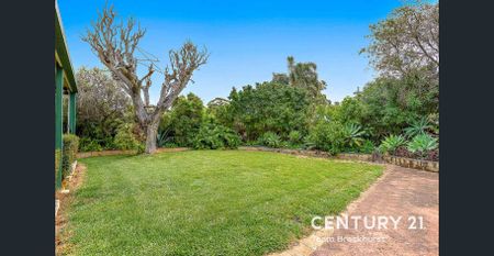 Charming 1950s Home with Modern Flexibility & Pristine Gardens! - Photo 3