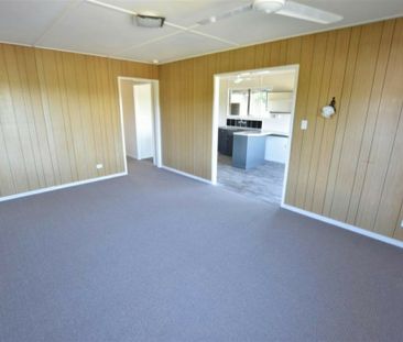 Spacious Family Home with Huge Yard, Side Access & Plenty of Storage! - Photo 2