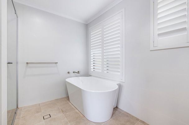 Modern, Light-Filled Family Home with Lawn Mowing Included! - Photo 1