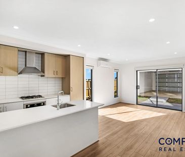 Beautifully Designed Four-Bedroom Home with Modern Comforts - Photo 3