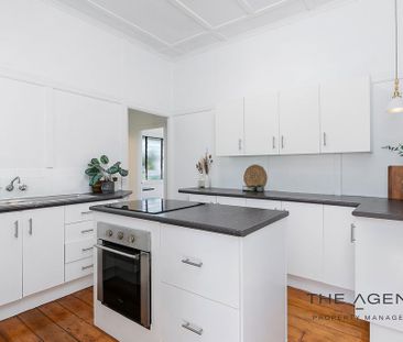 Comfortable 3-Bedroom Home in Convenient Berserker Location - Photo 2