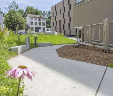 Appartement de 2.5 pièces au 1er étage avec balcon - Photo 1