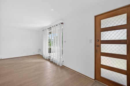 Open the door to coastal living - Photo 2