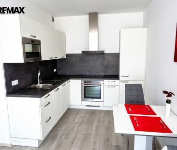 Exkluzivní pronájem novostavby zařízeného klimatizovaného bytu 2+kk... - Fotografie 1
