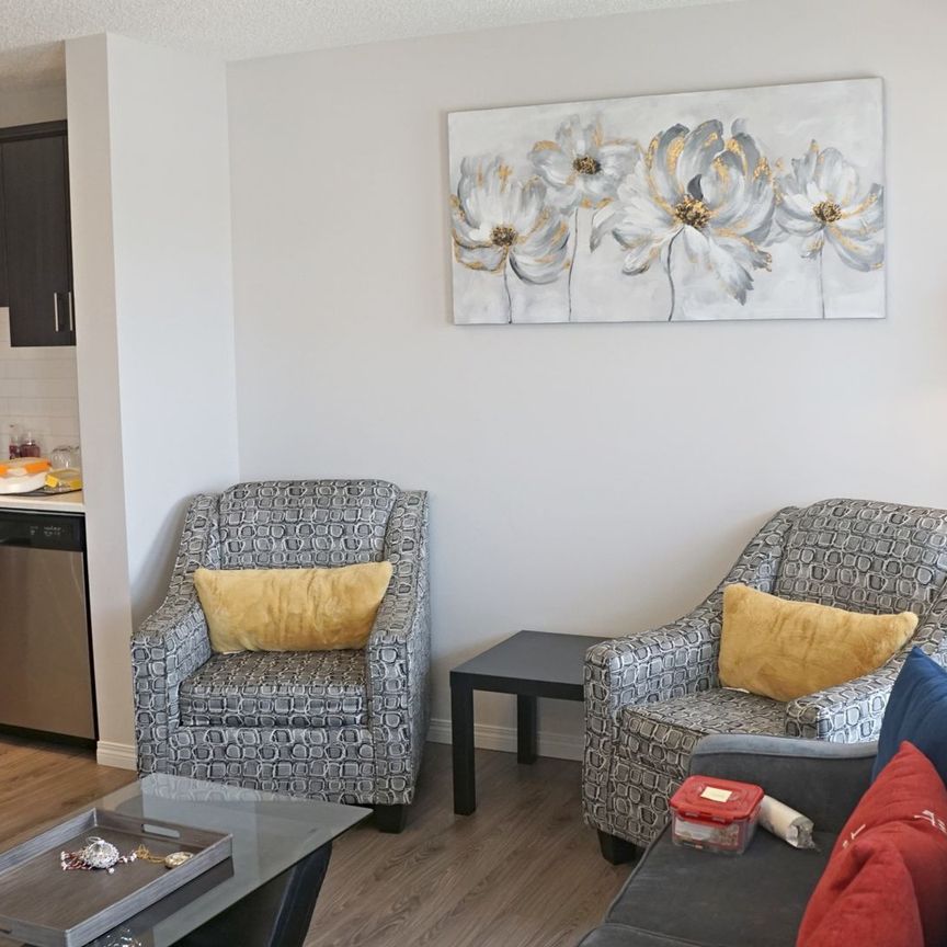 10799 Cityscape Drive NE | Townhouse | 3-bedroom, 2.5-bathroom | Double Garage - Photo 1