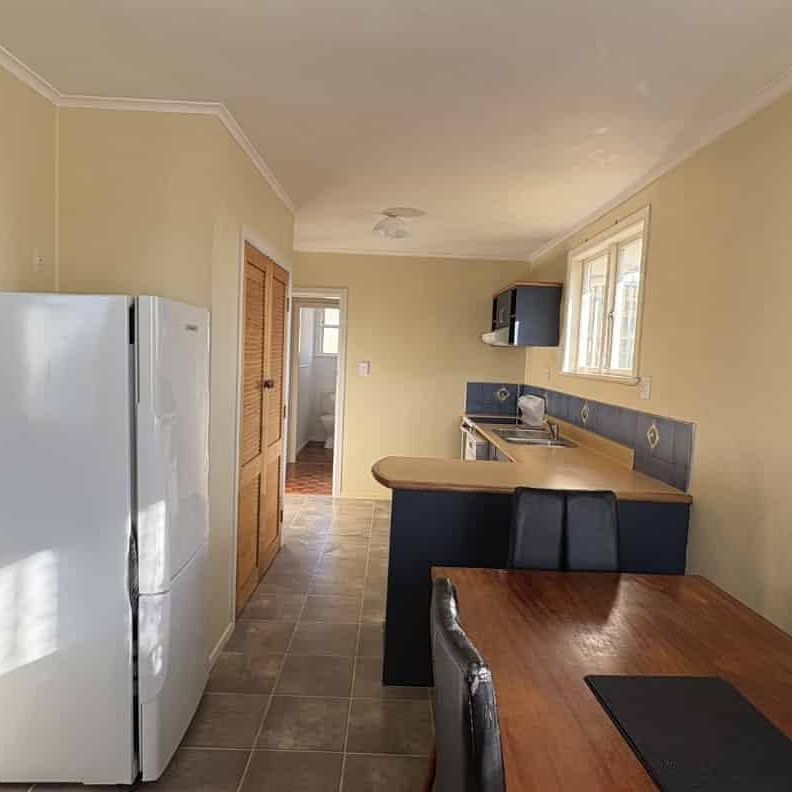 Tidy 3-Bedroom Home with Great Indoor-Outdoor Flow - Photo 1