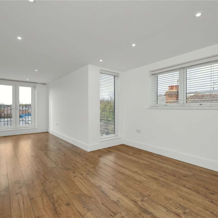 Four-bedroom home set on a private road, offering a harmonious blend of period character and contemporary style. Located within easy reach of local amenities, and excellent transport links. - Photo 1