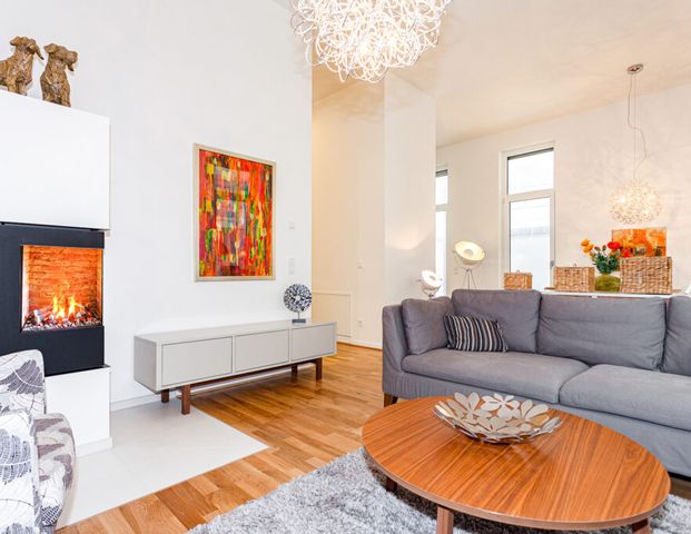 Attraktive 3-Zimmer-Erdgeschosswohnung mit Terrasse und Kamin! - Photo 1