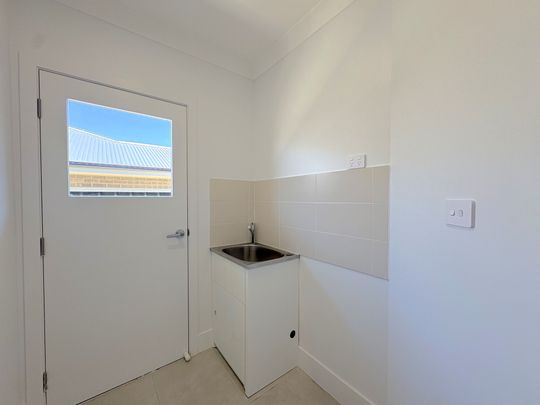 Modern 3-Bedroom Family Home with Ducted Air and Stylish Finishes - Photo 1