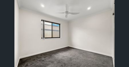 Rent Now! Ideal 4-BR Home with Tiled Living Areas & Lock-Up Garage! - Photo 2