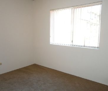 Two Bedroom Unit with Garage - Photo 5