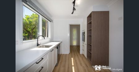 Stylish Family Home Backing onto Reserve - Photo 4