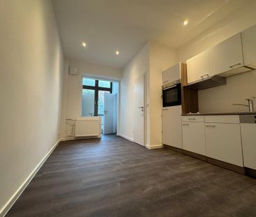 Modernisierte 1,5-Zimmer-Wohnung Einbauküche Gemeinschaftsgarten - Photo 4