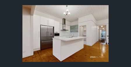 City Retreat with Enchanting Green Backdrop - Photo 4