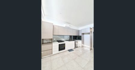 ALMOST NEW TWO BEDROOM APARTMENT - Photo 5