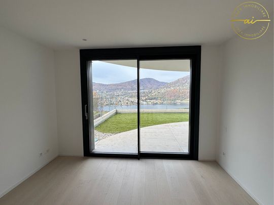 APPARTAMENTO 4.5 LOCALI CON VISTA LAGO - Foto 1