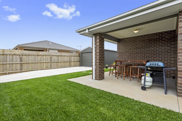 Spacious Family Home with Modern Comforts, Corner Block, and Easy Freeway Access - Photo 1