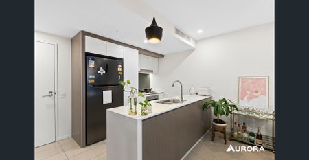 Stylish One-Bedroom Apartment with River Views and Expansive Balcony - Photo 3