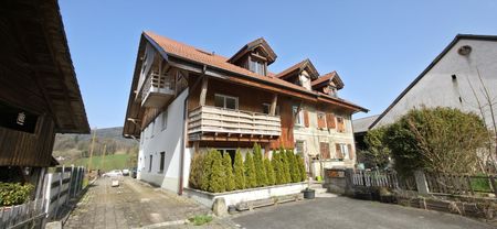 Rent a 4 ½ rooms apartment in Courchapoix - Photo 2