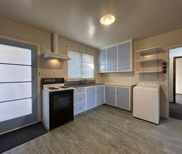 Two Bedroom Unit with Private Garden and Garage! - Photo 4