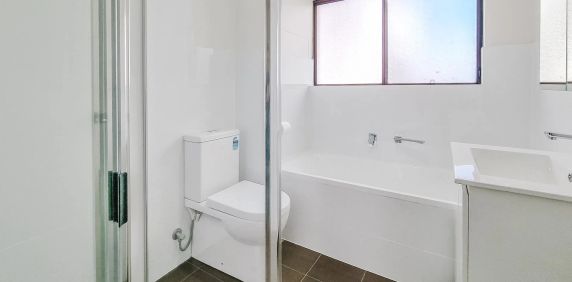 RENOVATED 2 BEDROOM UNIT WITH SPLIT AIR CONDITIONER - Photo 2