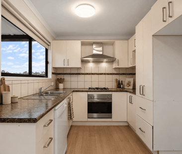 Fully Renovated in Convenient Windsor Location - Photo 4