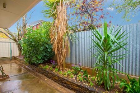 Stylish, Low-Maintenance Living in a Boutique Group of Four - Photo 3