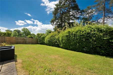 A detached family home set in a quiet no through road location within a short drive of Oxshott station. - Photo 3