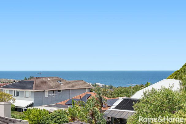 Serene Beachside Apartment with Sweeping Ocean Views - Photo 1